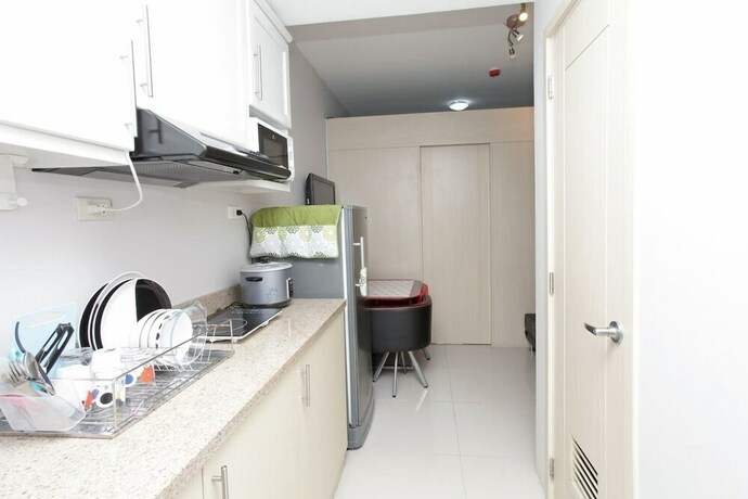 Imagen de la habitación del Hotel Grass Residences - Condo. Foto 31