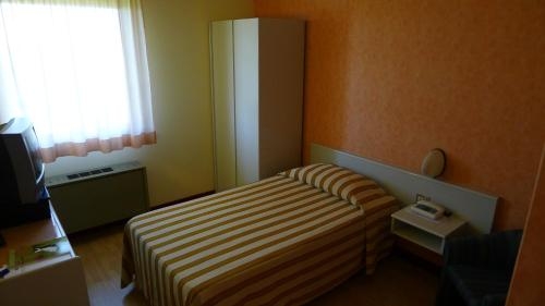 Imagen de la habitación del Hotel Grassetti. Foto 9