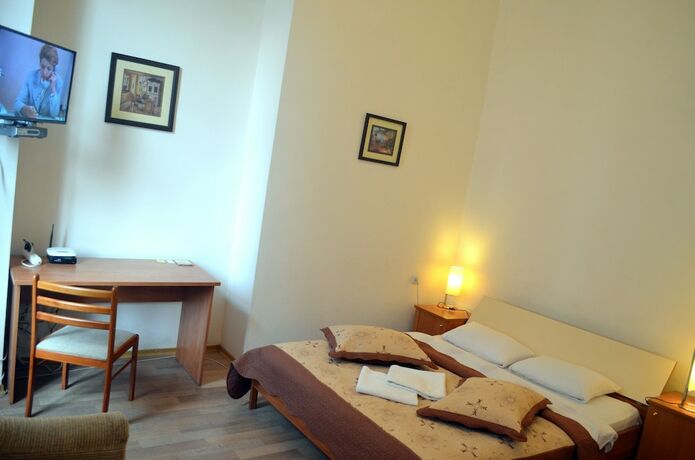 Imagen de la habitación del Hotel Grata Apartments. Foto 17