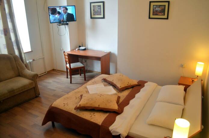 Imagen de la habitación del Hotel Grata Apartments. Foto 19