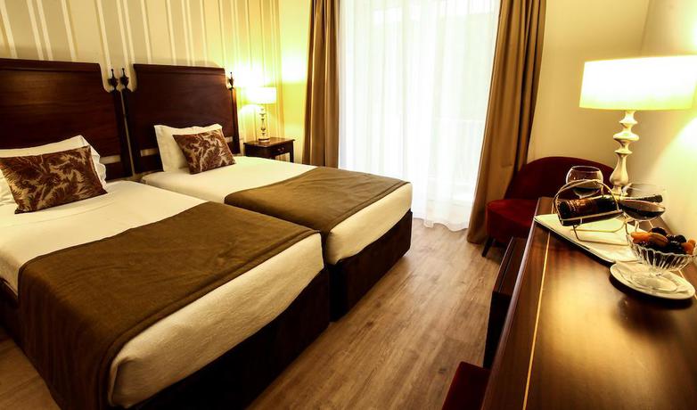 Imagen de la habitación del Hotel Grão Vasco Historic and Spa. Foto 8