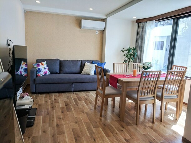 Imagen de la habitación del Hotel Grato Terrace. Foto 19