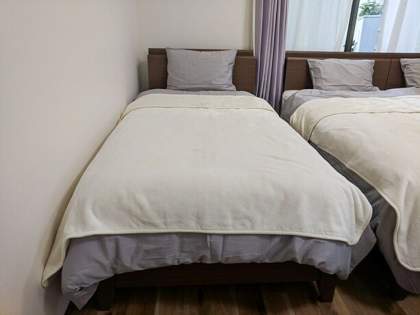 Imagen de la habitación del Hotel Grato Terrace. Foto 22