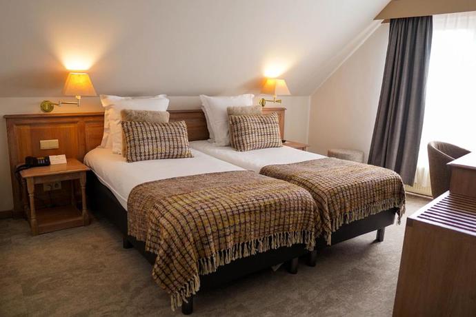 Imagen de la habitación del Hotel Gravensteen. Foto 11