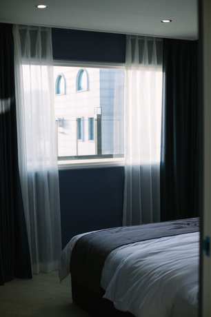 Imagen de la habitación del Hotel Gray Hotel. Foto 9