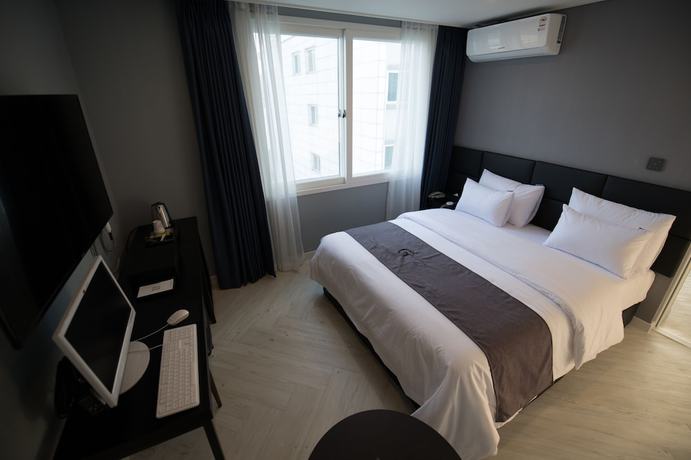 Imagen de la habitación del Hotel Gray Hotel. Foto 11