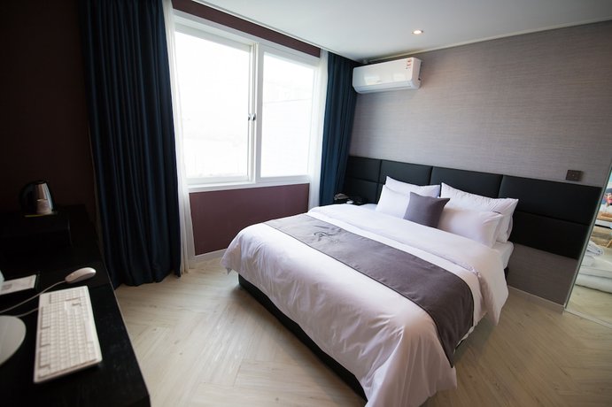 Imagen de la habitación del Hotel Gray Hotel. Foto 12