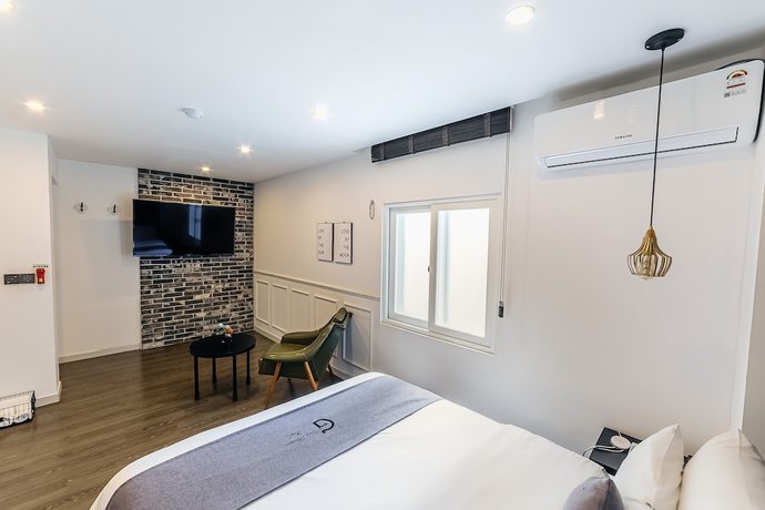 Imagen de la habitación del Hotel Gray Hotel. Foto 14