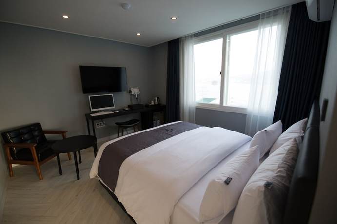 Imagen de la habitación del Hotel Gray Hotel. Foto 15