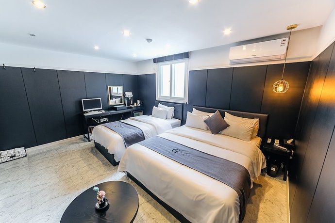 Imagen de la habitación del Hotel Gray Hotel. Foto 16