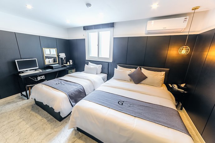 Imagen de la habitación del Hotel Gray Hotel. Foto 17