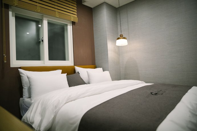 Imagen de la habitación del Hotel Gray Hotel. Foto 18