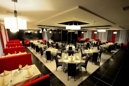 Imagen de la habitación del Hotel Gray Hotel Y Restaurant. Foto 4