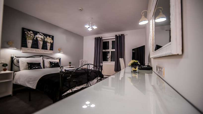 Imagen de la habitación del Hotel Gray Manor. Foto 6