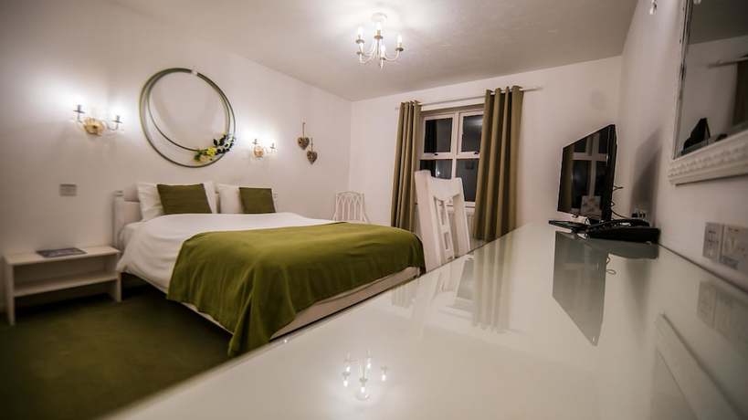 Imagen de la habitación del Hotel Gray Manor. Foto 9