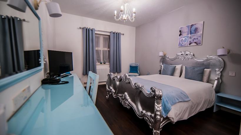 Imagen de la habitación del Hotel Gray Manor. Foto 11