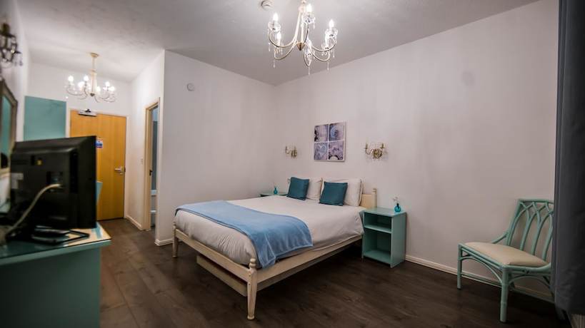 Imagen de la habitación del Hotel Gray Manor. Foto 12