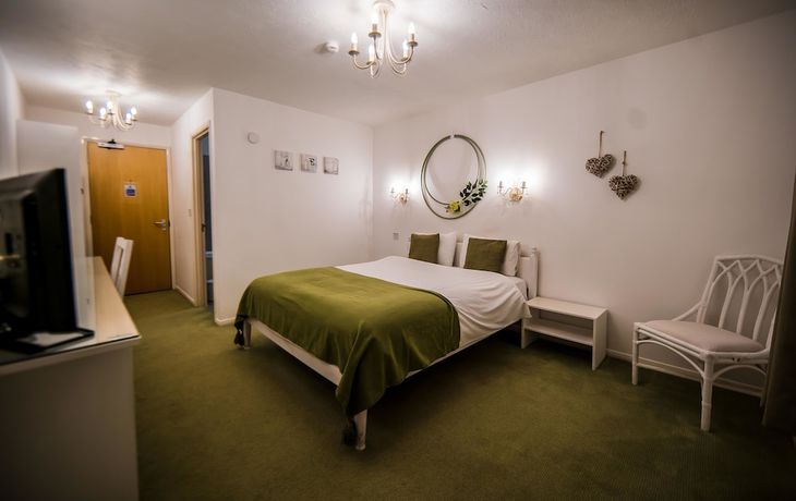 Imagen de la habitación del Hotel Gray Manor. Foto 14