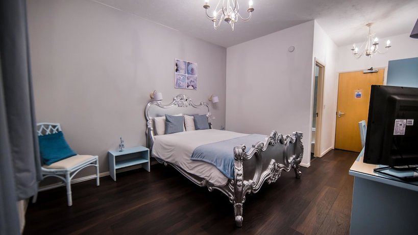 Imagen de la habitación del Hotel Gray Manor. Foto 15