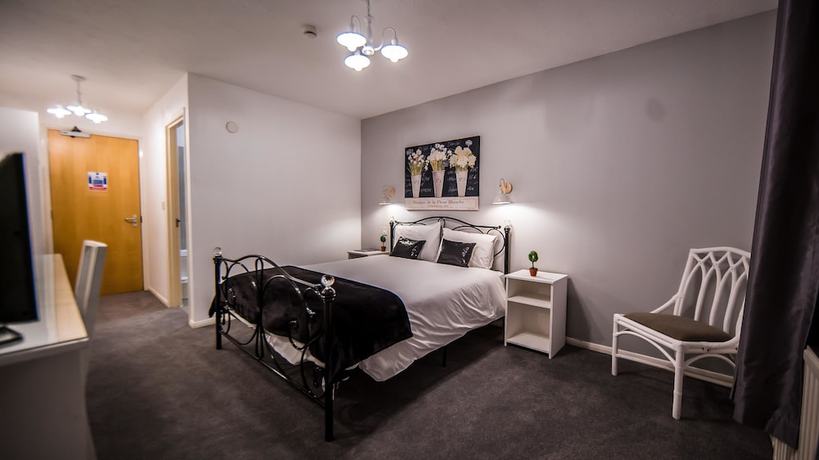 Imagen de la habitación del Hotel Gray Manor. Foto 16