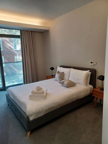 Imagen de la habitación del Hotel Grays Inn by Q Apartments. Foto 13
