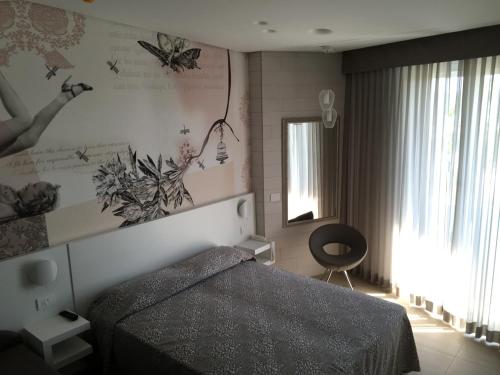 Imagen de la habitación del Hotel Graziella, Torre pedrera. Foto 6