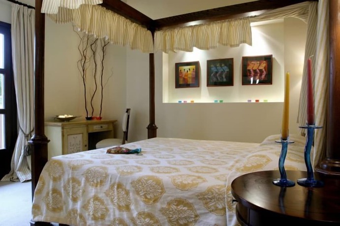 Imagen de la habitación del Hotel Great Greece Le Convivial Suites. Foto 6