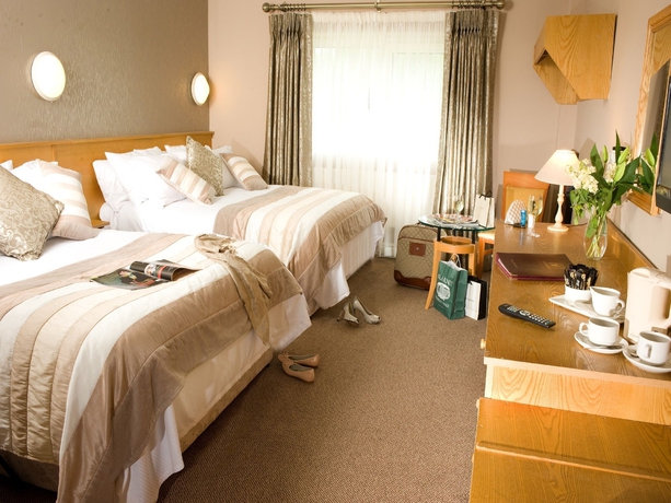 Imagen de la habitación del Hotel Great National Commons Inn. Foto 14