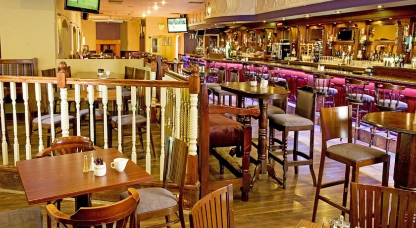 Imagen del bar/restaurante del Hotel Great National Commons Inn. Foto 3