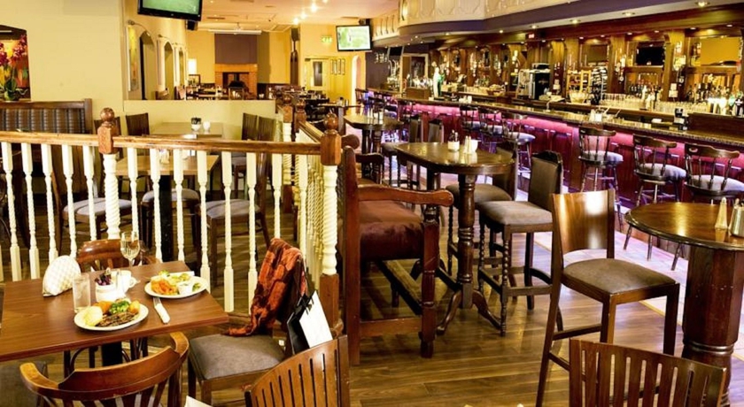 Imagen del bar/restaurante del Hotel Great National Commons Inn. Foto 4