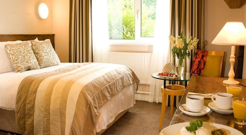 Imagen de la habitación del Hotel Great National Commons Inn. Foto 16