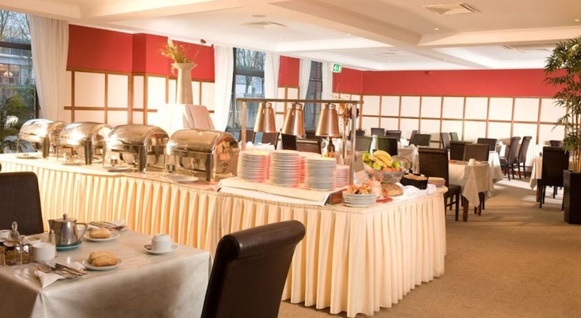 Imagen del bar/restaurante del Hotel Great National South Court. Foto 6