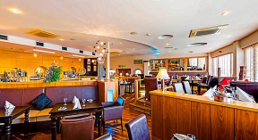 Imagen del bar/restaurante del Hotel Great National South Court. Foto 7