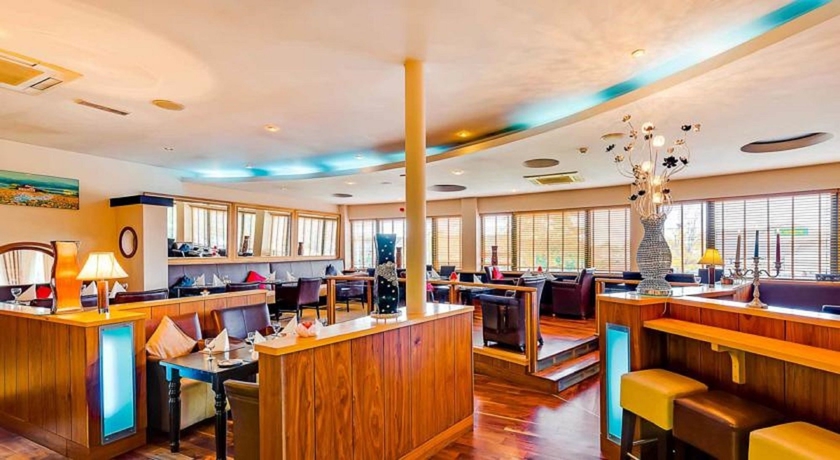 Imagen del bar/restaurante del Hotel Great National South Court. Foto 8