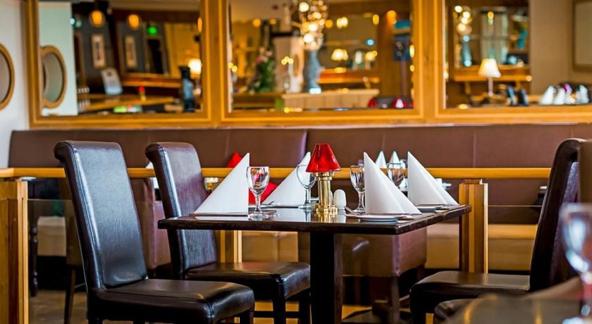 Imagen del bar/restaurante del Hotel Great National South Court. Foto 9