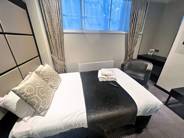 Imagen de la habitación del Hotel Great St Helen. Foto 15