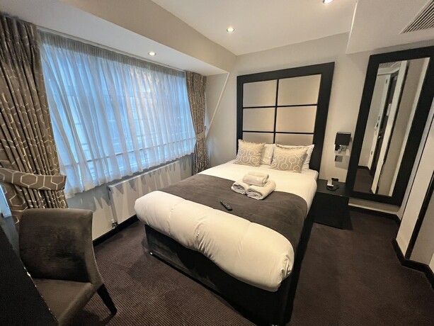 Imagen de la habitación del Hotel Great St Helen. Foto 16