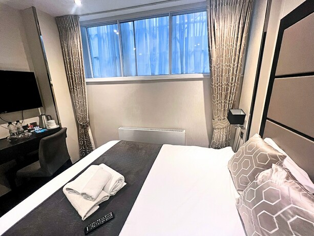 Imagen de la habitación del Hotel Great St Helen. Foto 20