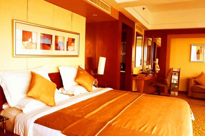 Imagen de la habitación del Hotel Great Tang. Foto 7