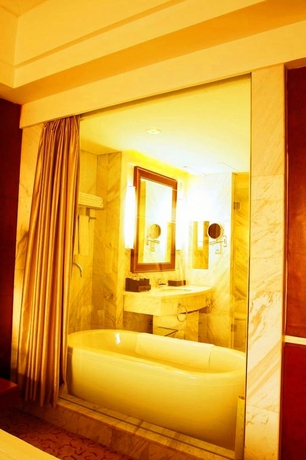 Imagen de la habitación del Hotel Great Tang. Foto 11