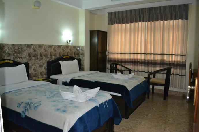Imagen de la habitación del Hotel Greatwall International. Foto 2