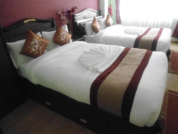 Imagen de la habitación del Hotel Greatwall International. Foto 9