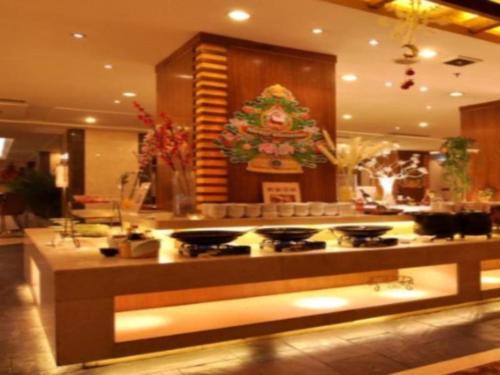 Imagen general del Hotel Greatwall - Zhengzhou. Foto 2