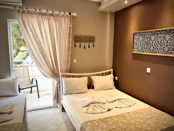 Imagen de la habitación del Hotel Grecian Sea. Foto 17