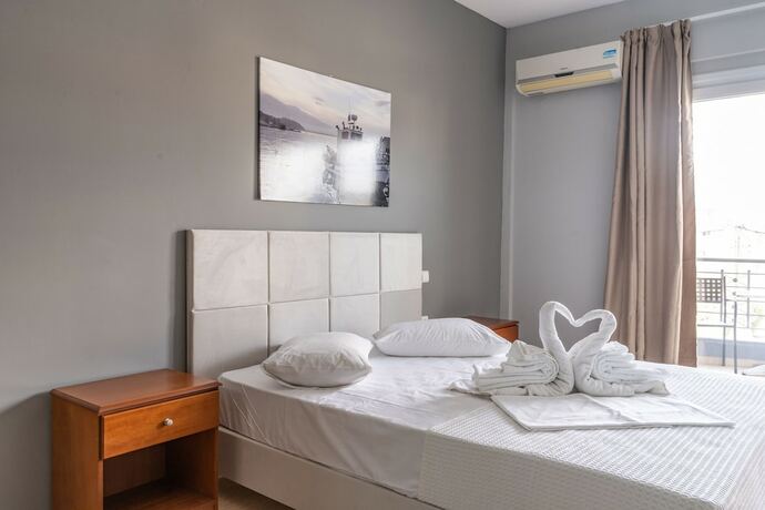 Imagen de la habitación del Hotel GrecoInn Atrium. Foto 12