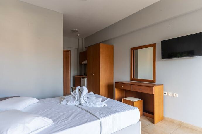 Imagen de la habitación del Hotel GrecoInn Atrium. Foto 14