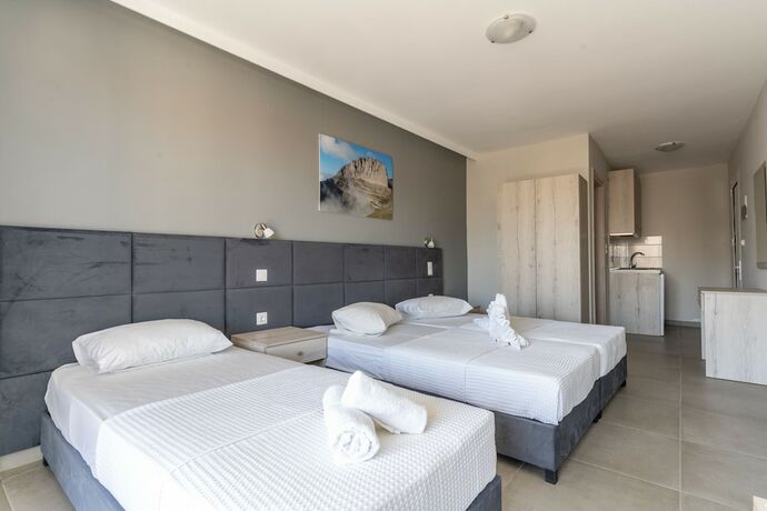 Imagen de la habitación del Hotel GrecoInn Atrium. Foto 18