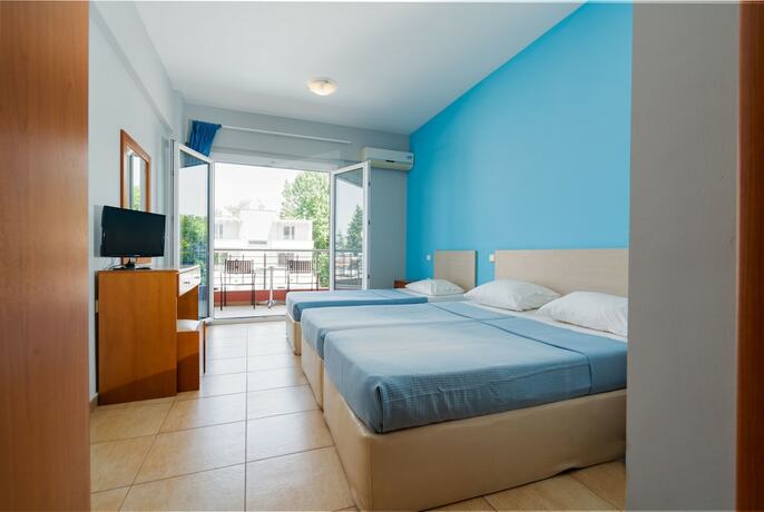 Imagen de la habitación del Hotel GrecoInn Atrium. Foto 19