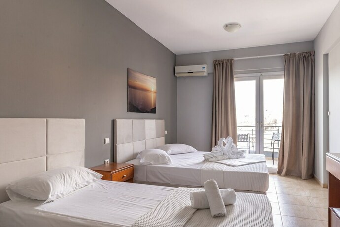 Imagen de la habitación del Hotel GrecoInn Atrium. Foto 20