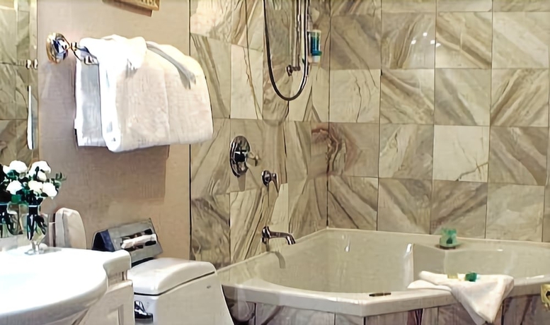 Imagen de la habitación del Hotel Green Acres Inn. Foto 12